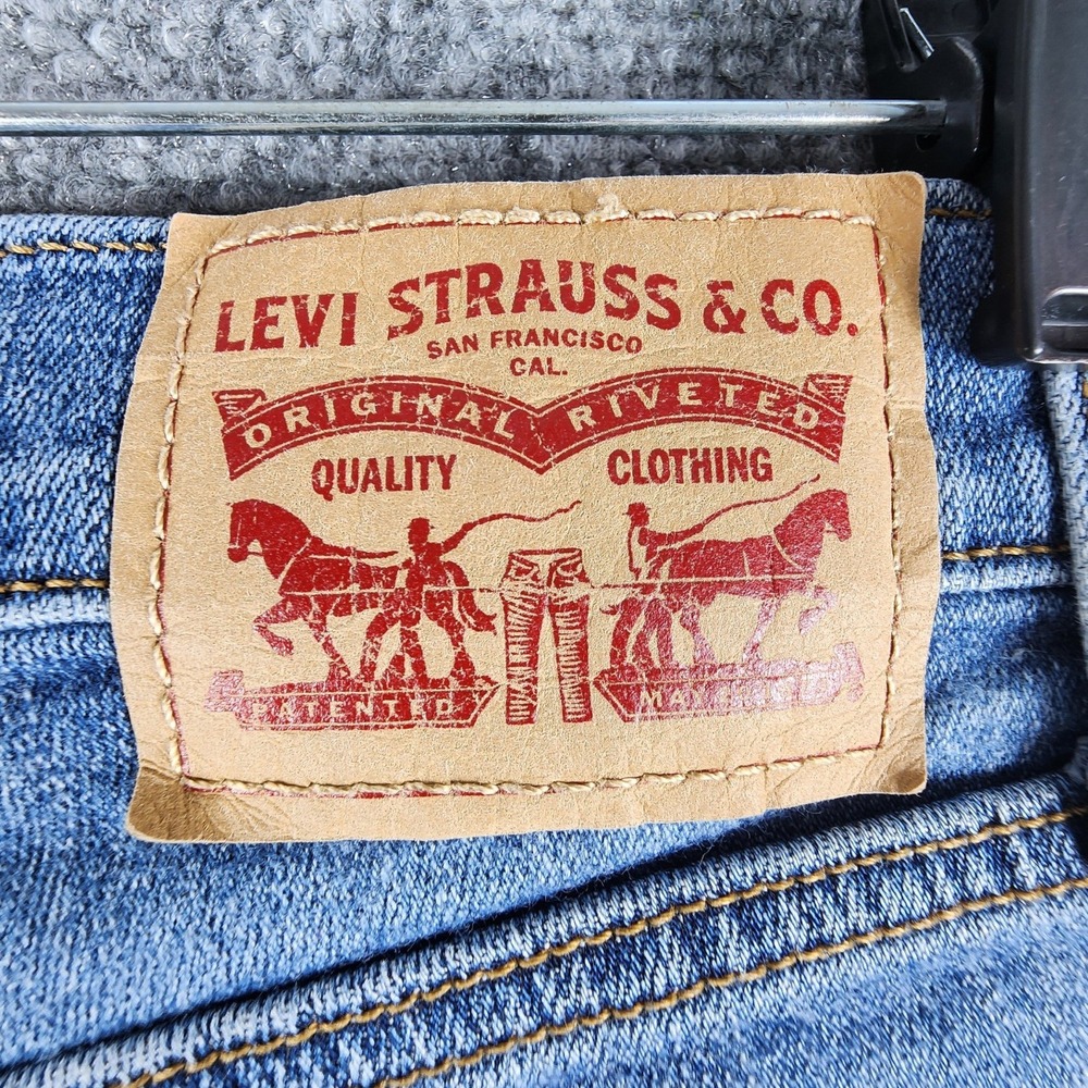 Levis Womens High Rise Medium Wash Distressed Denim Shorts Raw Hem Medium Blue - Picture 3 of 6